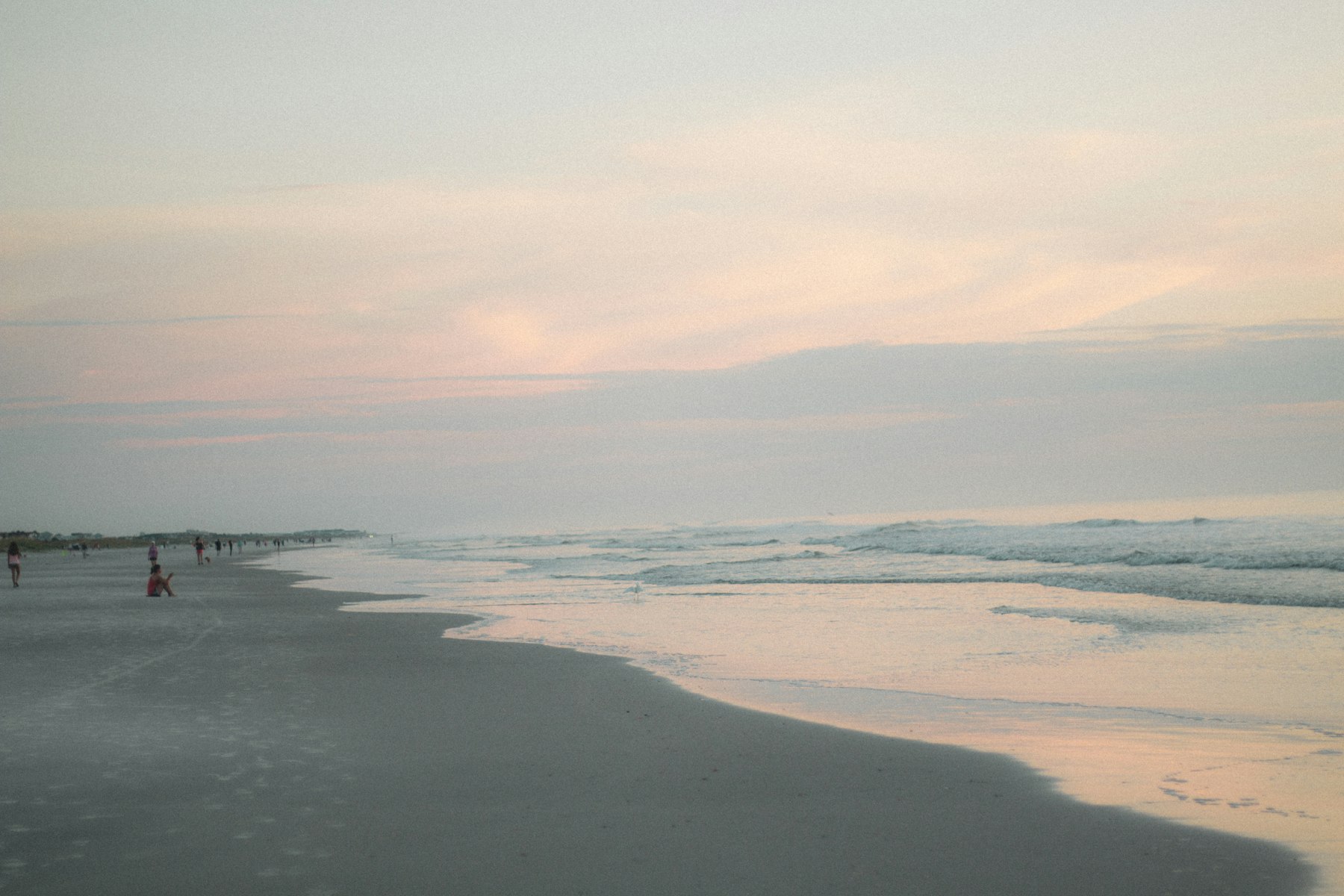 Soft evening light over a quiet beach